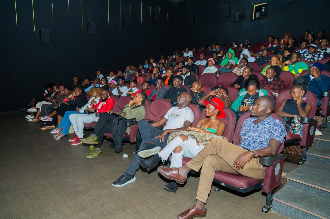 A full cinema audience watching the Sauti ya Mtaa premiere