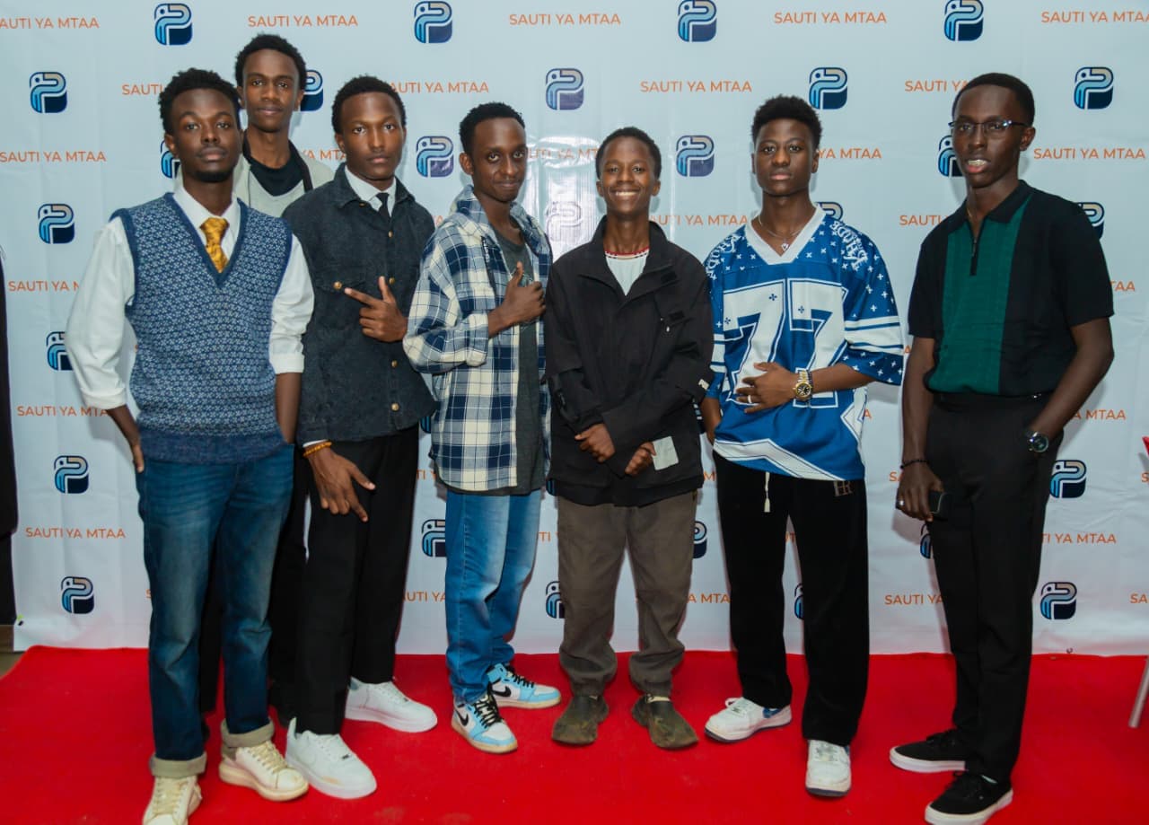 Event guests and organisers gathered on a red carpet