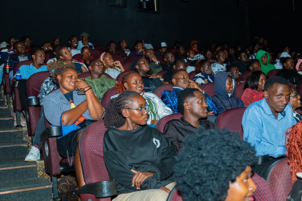Audience members watching a live event