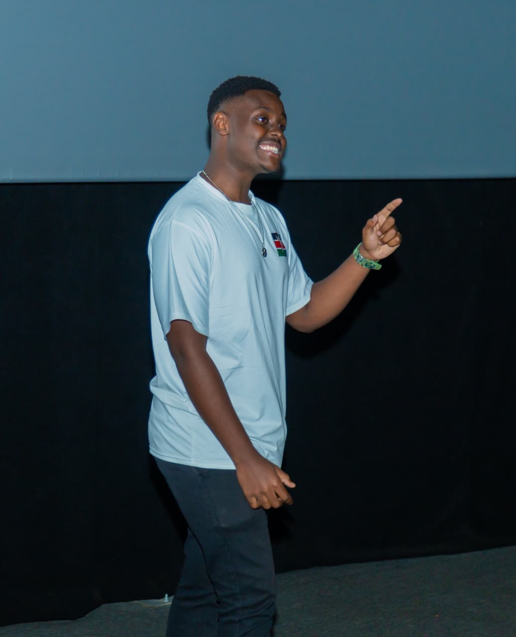 A technology presentation on a lit stage